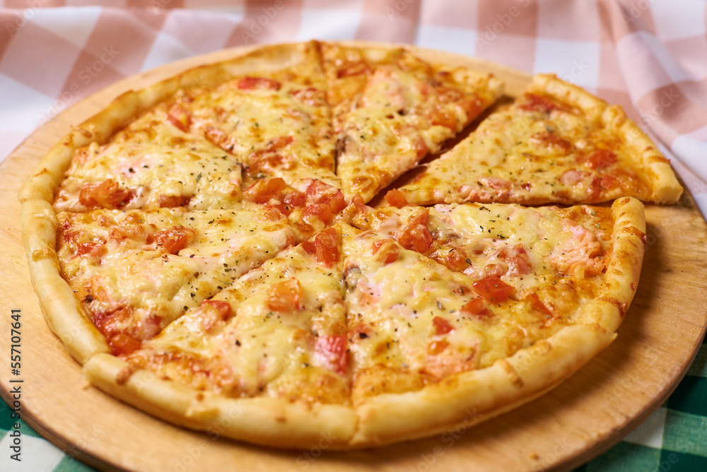 italian pizza with tomatoes and chicken meat