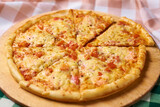 italian pizza with tomatoes and chicken meat