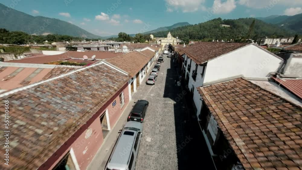 Aerial FPV shot of arch street of Antigua Guatemala.. Aerial FPV shot of arch street of Antigua Guatemala..