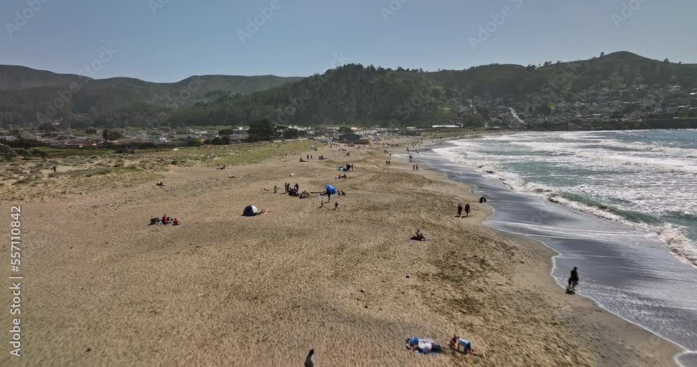 Pacifica California Aerial v3 low level flyover state beach at linda mar capturing beachgoers on the sandy shore with san pedro mountain valley view on a sunny day - Shot with Mavic 3 Cine - May 2022 Pacifica California Aerial v3 low level flyover state beach at linda mar capturing beachgoers on the sandy shore with san pedro mountain valley view on a sunny day - Shot with Mavic 3 Cine - May 2022