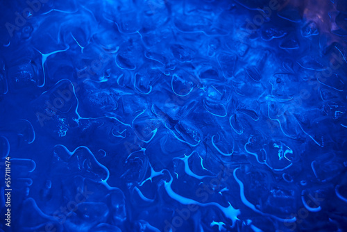 ice in water in blue light