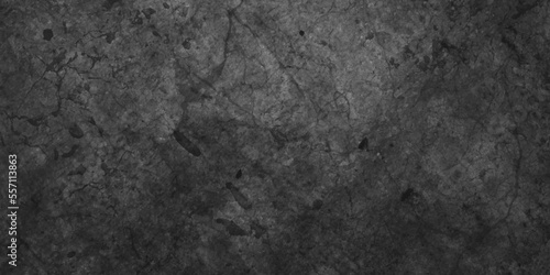 Abstract cracked stone wall texture, texture of old and grainy dark concrete wall, Panorama of Dark grey black slate grunge texture, black stone wall for cover, wallpaper and construction.  © DAIYAN MD TALHA