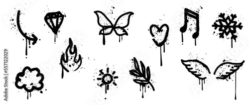 Set of graffiti spray pattern vector illustration. Collection of spray texture arrow  diamond  butterfly  flame  wing  leaf branch. Elements on white background for banner  decoration  street art.
