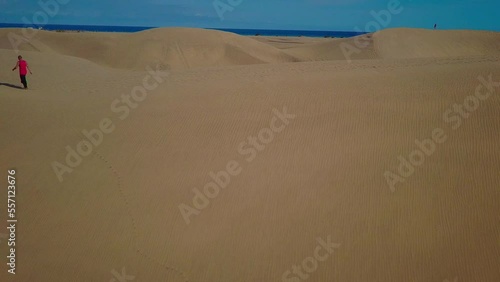 a man walking on the dunes. High quality FullHD footage