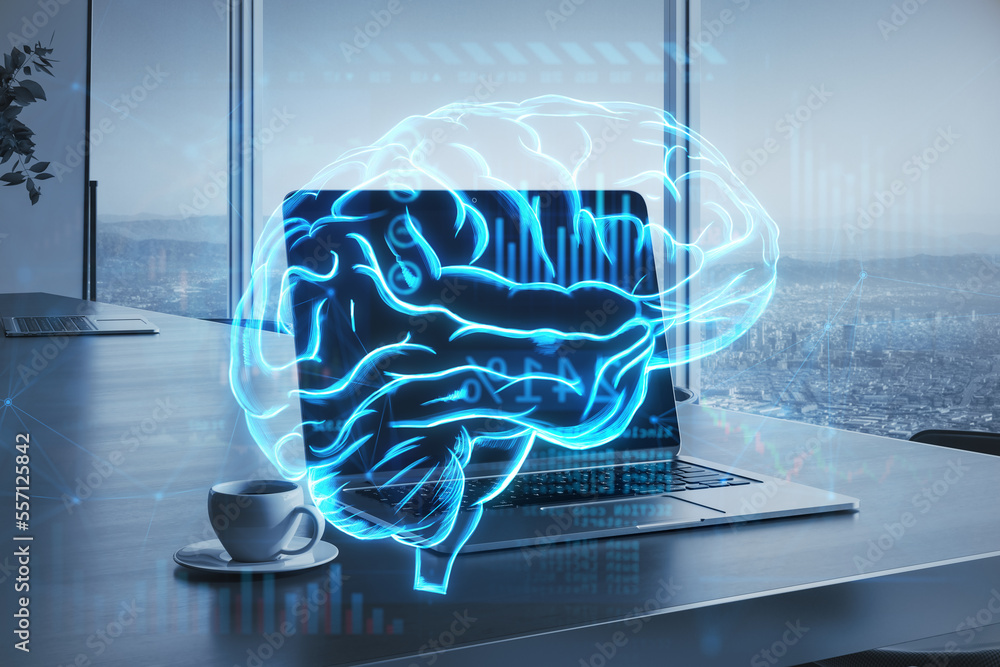 desktop with laptop, coffee cup and glowing digital brain hologram on ...