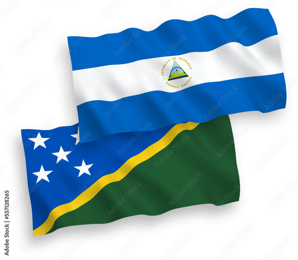 National vector fabric wave flags of Nicaragua and Solomon Islands isolated on white background. 1 to 2 proportion. National vector fabric wave flags of Nicaragua and Solomon Islands isolated on white background. 1 to 2 proportion.