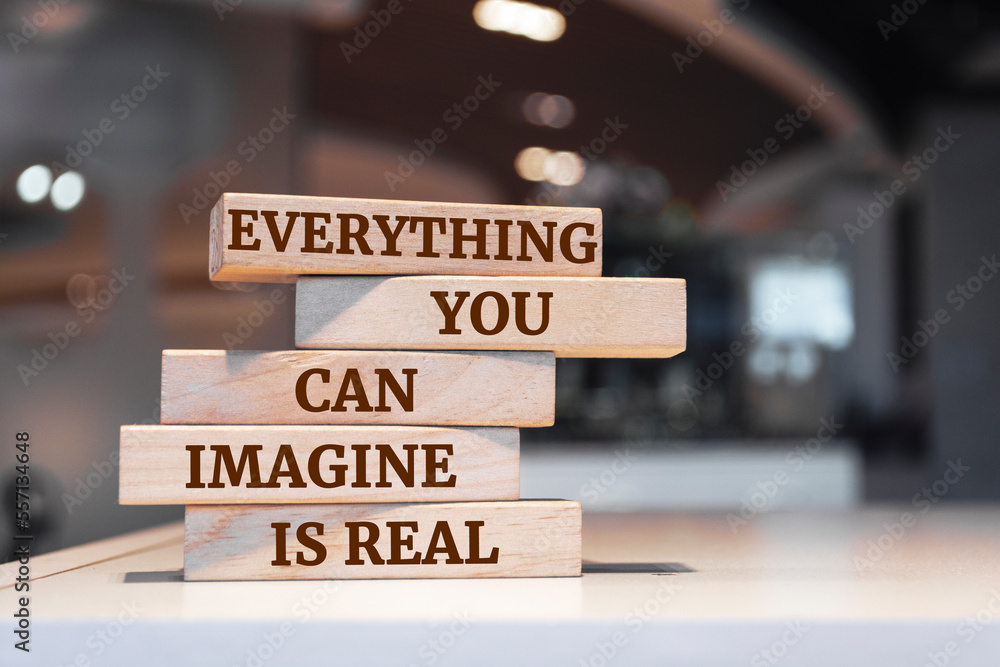 Wooden blocks with words 'Everything you can imagine is real'.