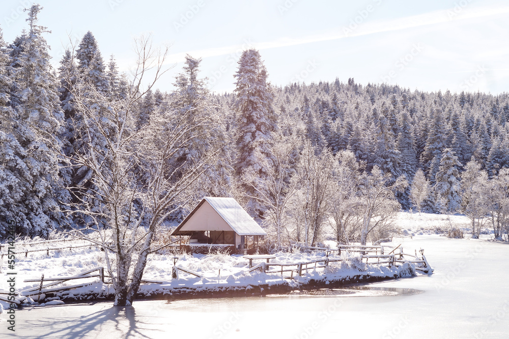 A hut by the frozen lake.