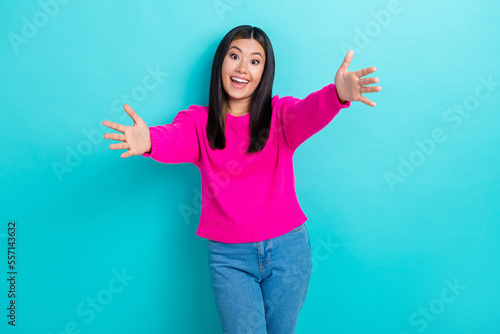 Photo of excited funny friendly person vietnamese lady wear stylish outfit want hug everyone look you isolated on aquamarine color background