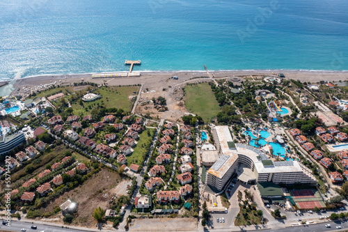 Fototapeta Naklejka Na Ścianę i Meble -  Summer vacation on beach, Hotels sea, beach, coast, water sports and Sun, Manavgat holiday tourist region. Drone Aerial view. Mediterranean, Örenşehir, Manavgat -TURKEY 