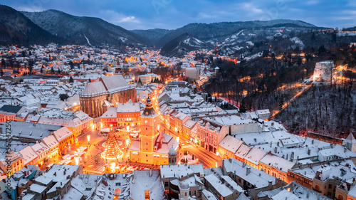 Brasov, Romania - Winter scenic landscape with Christmas Market and Carpathian Mountains
