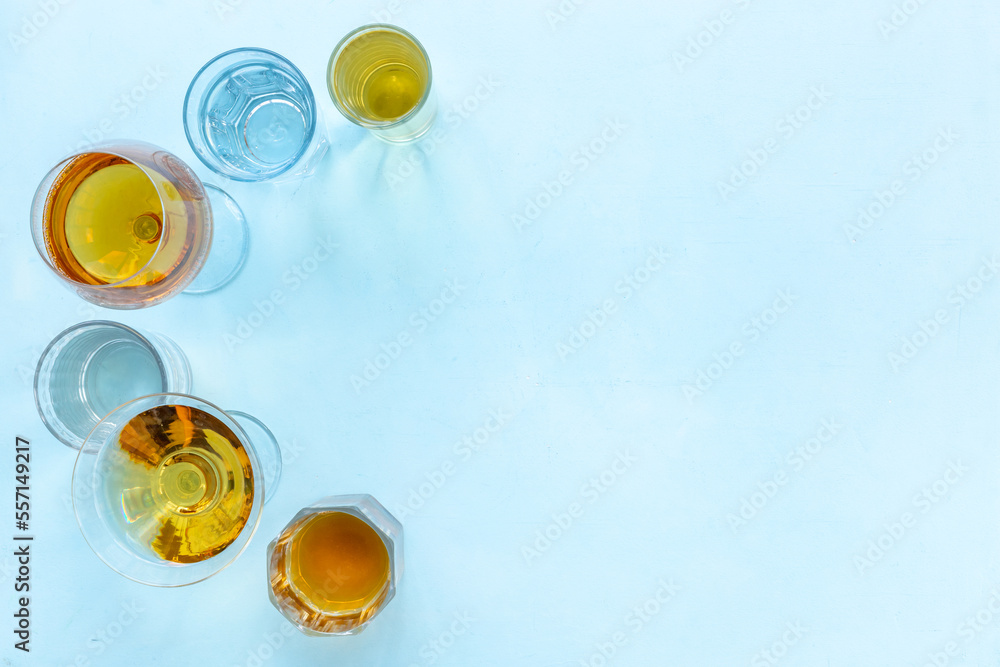Alcohol in glasses with ice. Strong alcoholic drinks background Alcohol in glasses with ice. Strong alcoholic drinks background