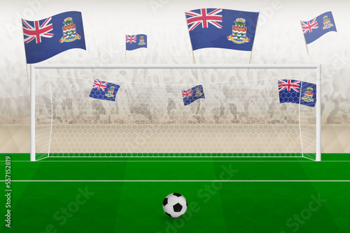 Cayman Islands football team fans with flags of Cayman Islands cheering on stadium, penalty kick concept in a soccer match.