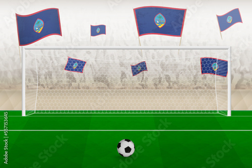 Guam football team fans with flags of Guam cheering on stadium, penalty kick concept in a soccer match.