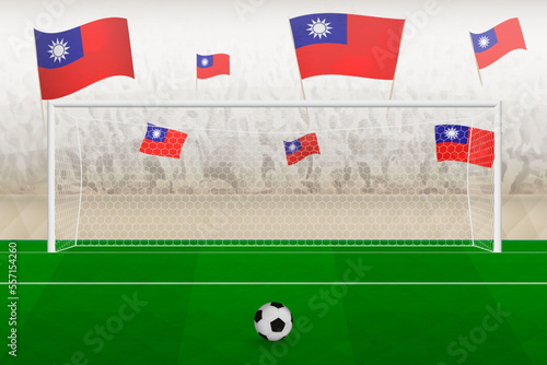 Taiwan football team fans with flags of Taiwan cheering on stadium, penalty kick concept in a soccer match.