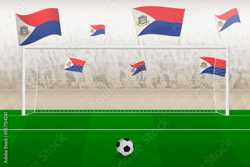 Sint Maarten football team fans with flags of Sint Maarten cheering on stadium, penalty kick concept in a soccer match.