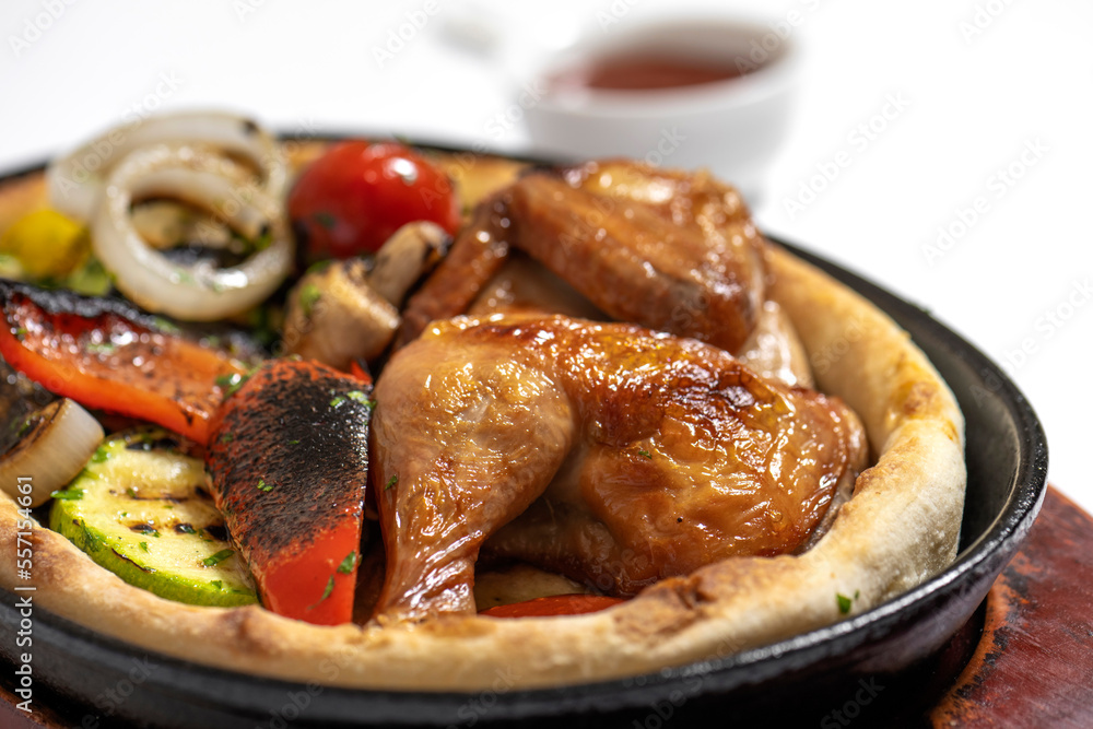 close up of fried chicken with vegetables close up of fried chicken with vegetables