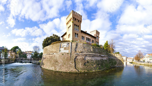 Treviso e il castello nel centro storico - monumenti, edifici storici  tra le mura della città trevigiana circondata dal fiume Sile photo