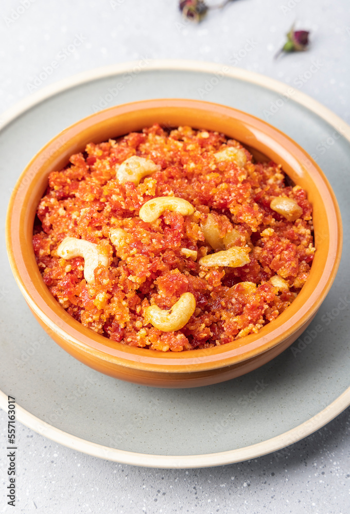 Gajar ka halwa is, Popular Indian dessert pudding made with grated carrots, milk, sugar and nuts served hot with a garnish of almonds, cashew nuts and pistachios.
Gajar ka halwa is, Popular Indian dessert pudding made with grated carrots, milk, sugar and nuts served hot with a garnish of almonds, cashew nuts and pistachios.