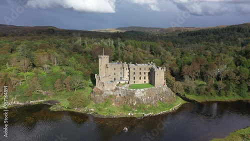 Dunvegan Castle and harbour on the Island of Skye, Scotland photo