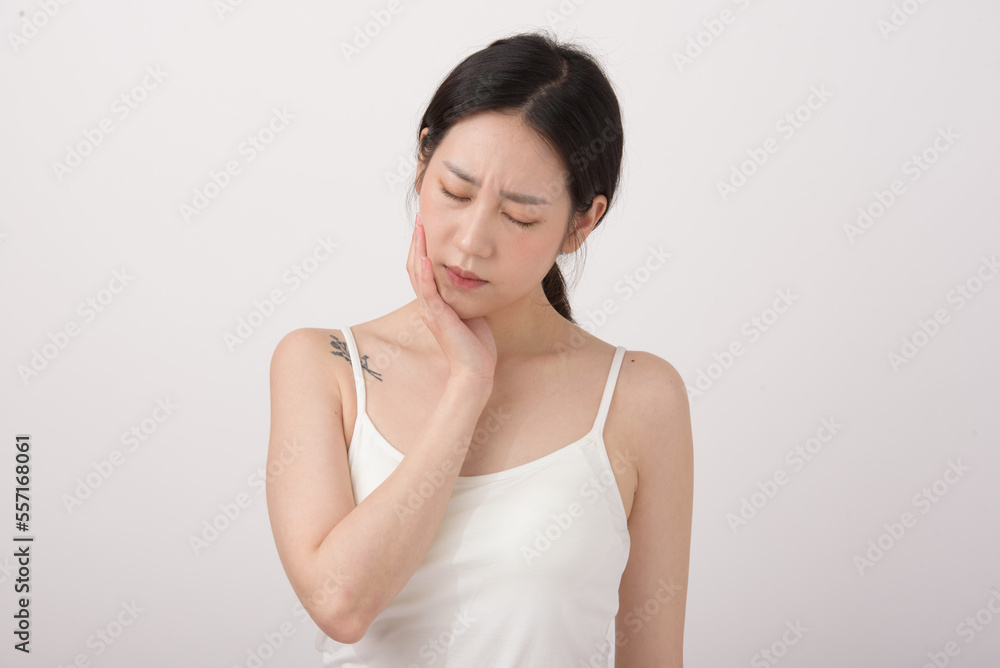 adult woman feels sick, while standing and suffering from unbearable pain. adult woman feels sick, while standing and suffering from unbearable pain.
