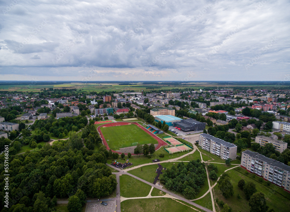 Radviliskis City in Lithuania. Sport Stadium and Cityscape, Skyline in Background. Aerial, Architecture.