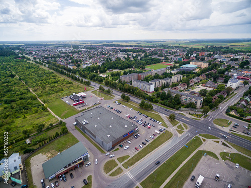 Radviliskis City in Lithuania. Cityscape and Drone Point of View. Road and Park in Background. Shopping Mall
