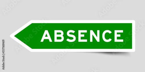Green color arrow shape sticker label with word absence on gray background