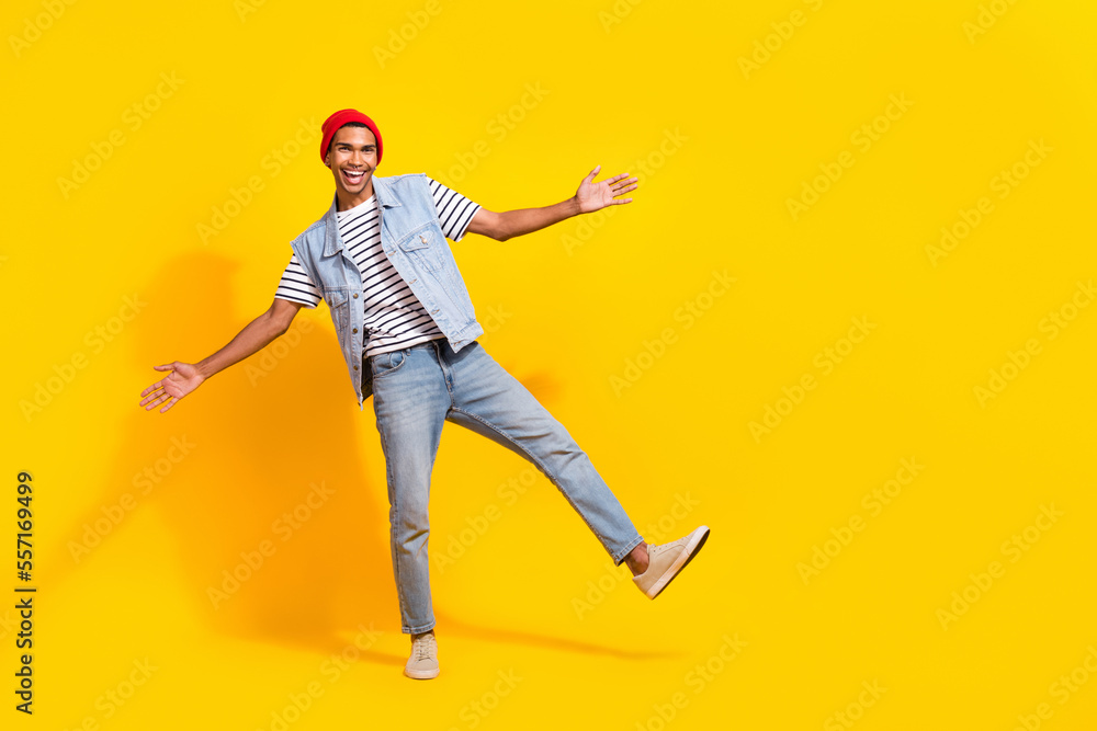 Full size portrait of carefree overjoyed person have fun empty space ad blank isolated on yellow color background