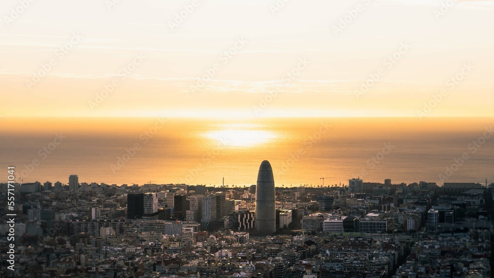 Panoramic view of the city with the sunset in the sea
