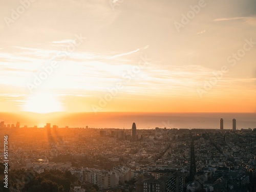 Panoramic views on the city with the sunset on the skyline