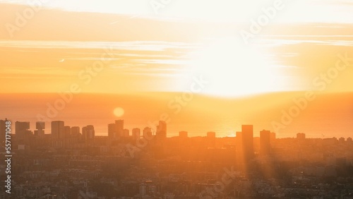 Silhouette of the buildings of a city during sunset