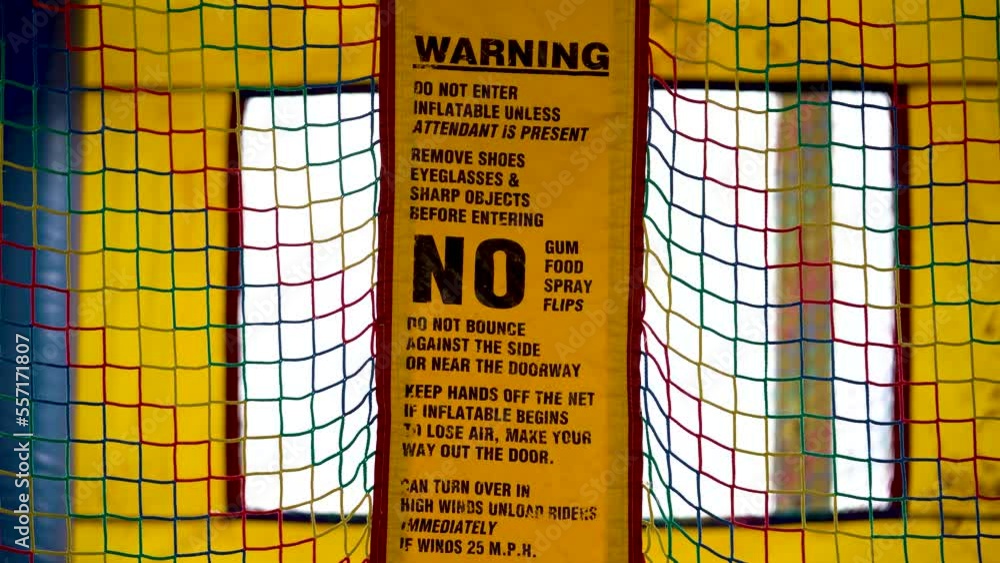 Trampoline. Warning rules in playground park, for trampoline. Game time