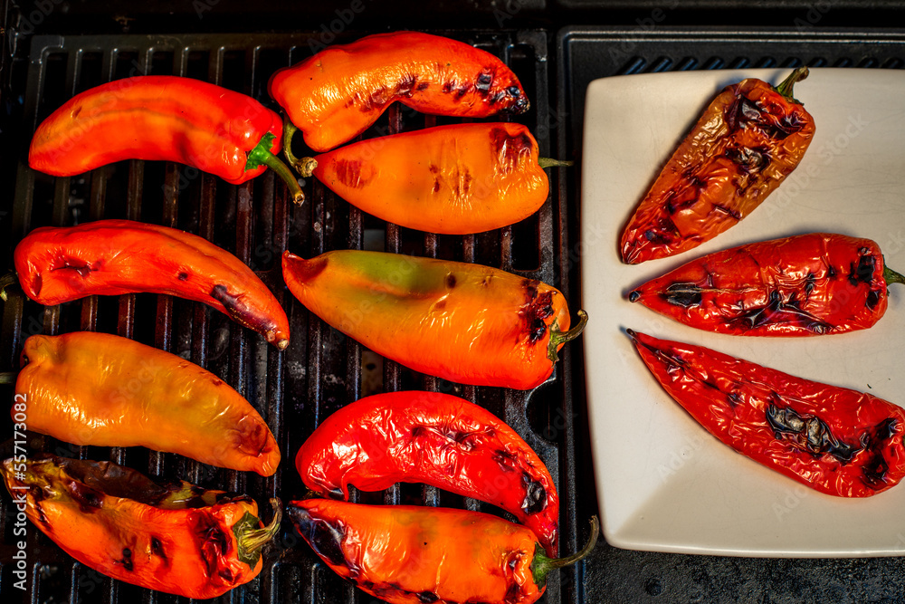 Red sweet kapia paprika on the grill Stock | Stock