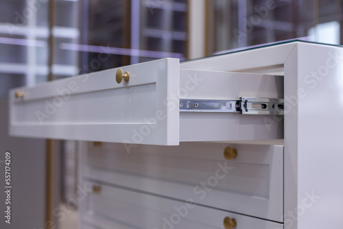 Modern MDF furniture, detail on the drawer.