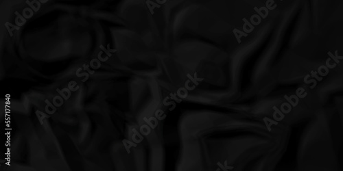 Dark Black facbric paper backdrop crumpled texture. dark black textured crumpled black paper background. panorama black paper texture background, crumpled pattern.