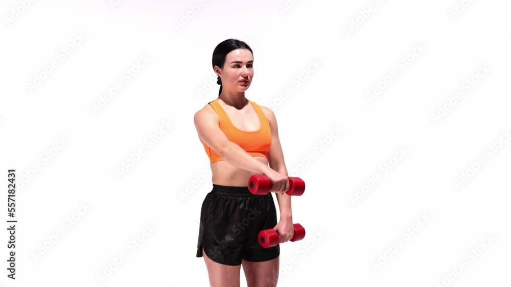 Young sportive girl training with dumbbells over white studio background. Lifting weights in turns. Concept of sport, health, fitness, body care Young sportive girl training with dumbbells over white studio background. Lifting weights in turns. Concept of sport, health, fitness, body care