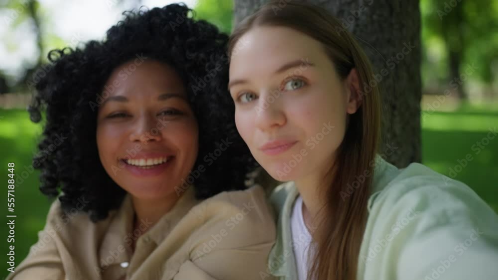 Closeup of female friends talking selfie together, social media influencers Closeup of female friends talking selfie together, social media influencers