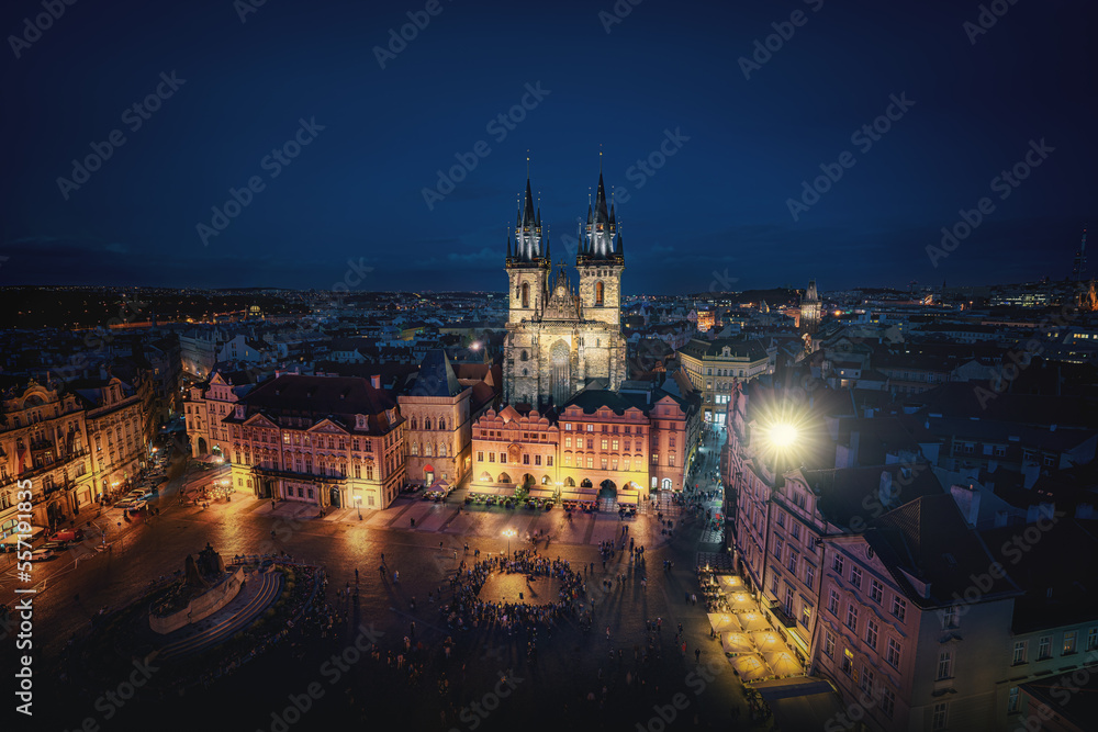 Fototapeta premium Aerial view of Old Town Square with Illuminated Tyn Church at night - Prague, Czech Republic