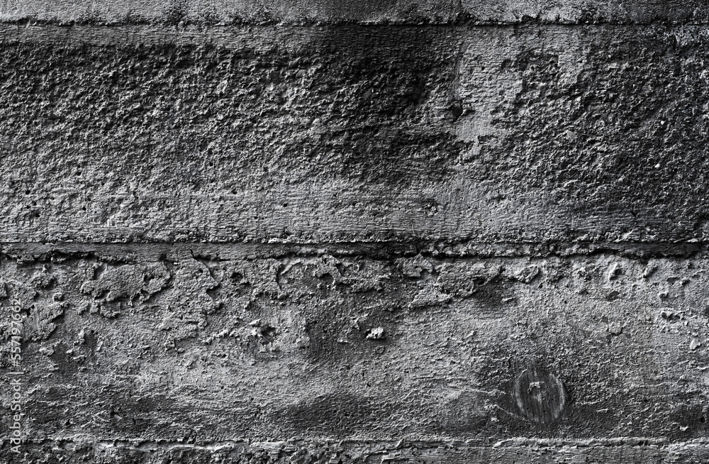 Fototapeta premium Dark concrete wall with imprint relief of wooden formwork