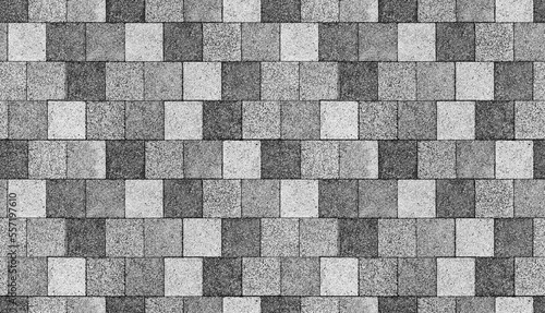 фотографія Gray paving slabs, pedestrian lane paving, top view