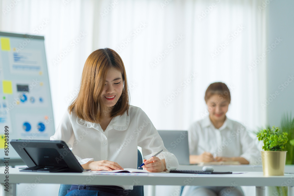 © Phushutter - Friends of asia female employee worker discussing and accountant checking data document for investigation of corruption account. Anti Bribery concept, great business conversations