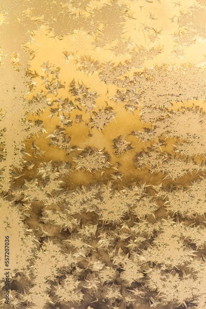 Frosty drawing on the window close-up in winter Frosty drawing on the window close-up in winter
