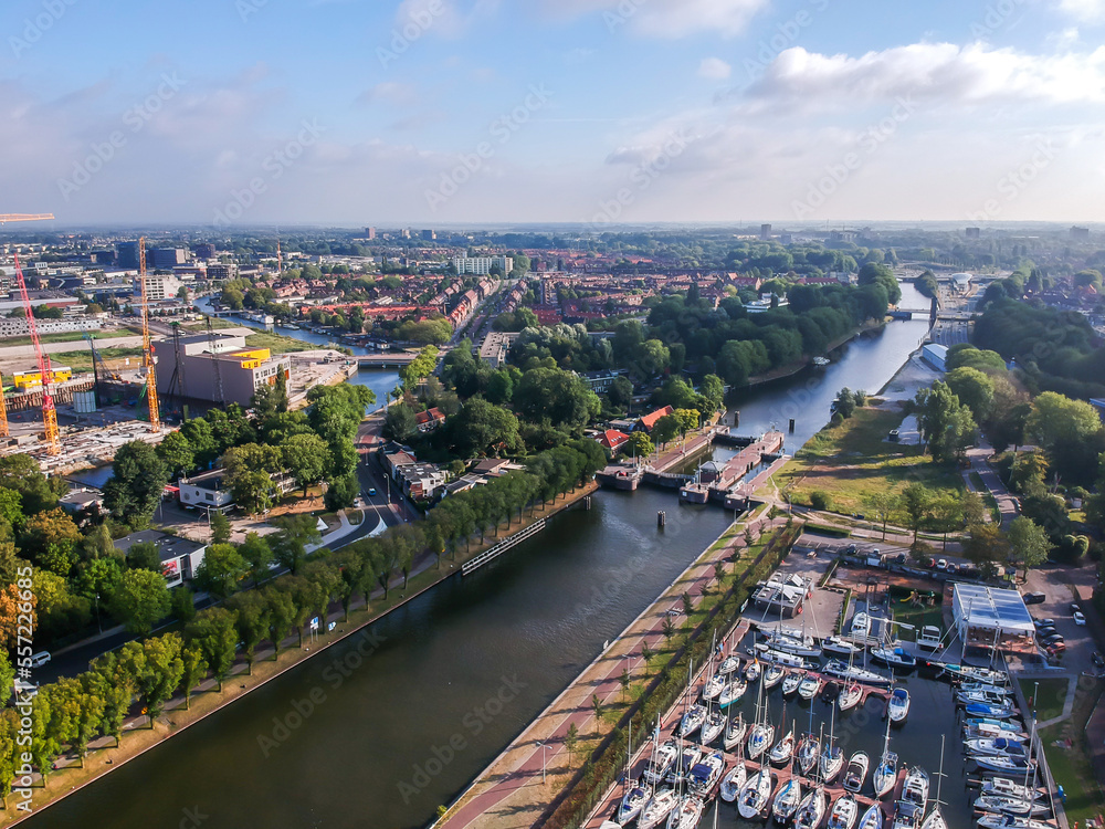 Drone shot of Amsterdam with marina and canal