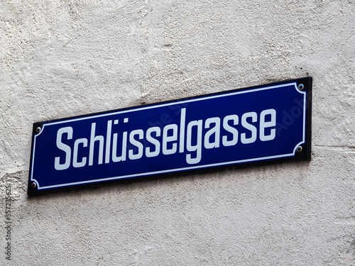 Signboard with the street name Schlusselgasse - Key Alley in Zurich, Switzerland