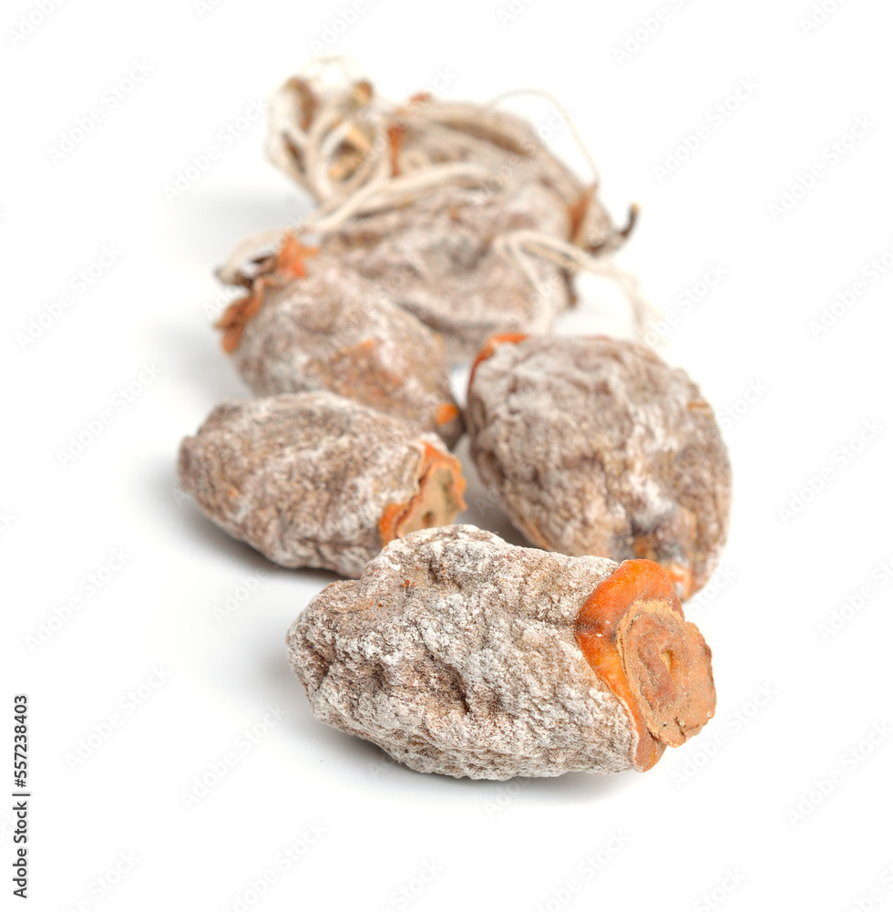 Obraz premium Whole dried oriental persimmons isolated on white background