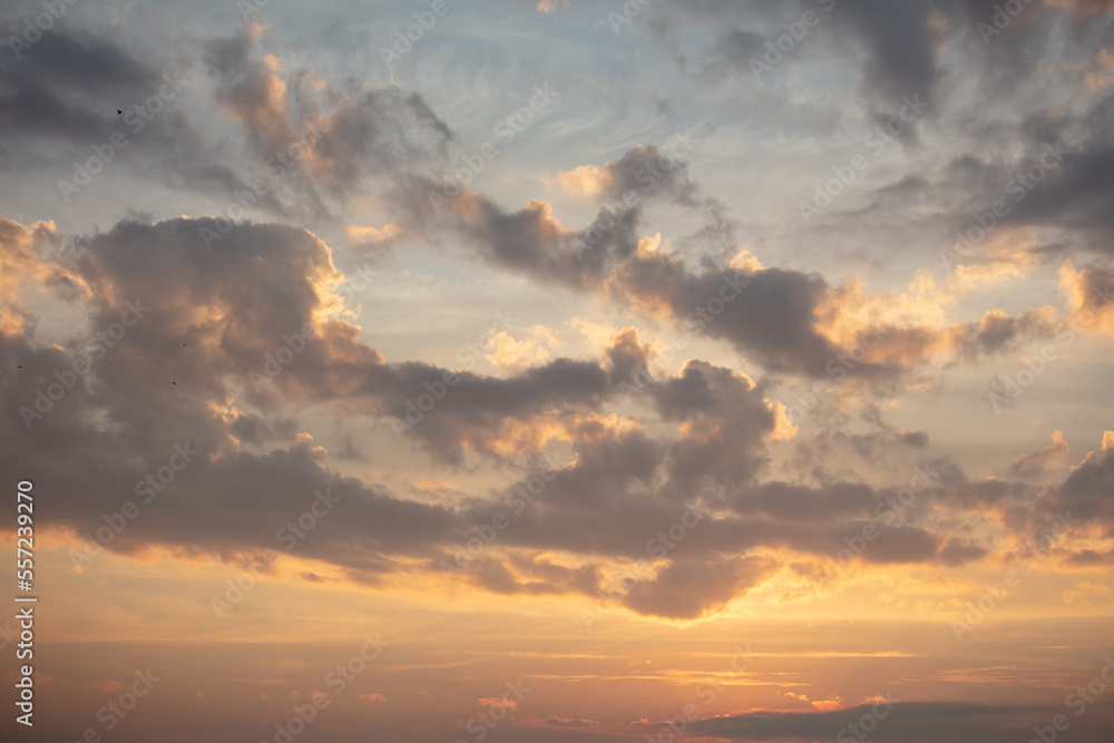 Fototapeta premium Colorful clouds at sunset as background.