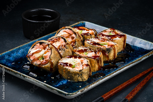 Fried sushi rolls with shrimp, cream cheese, avocado, sesame and teriyaki sauce.