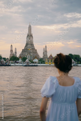 tourist girl at wat arun temple in bangkok, thailand © cassiokendi