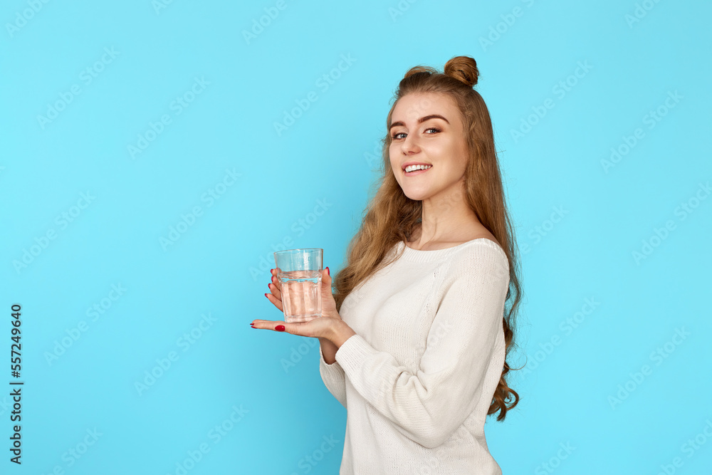 curly brunette woman with drinking glass of water curly brunette woman with drinking glass of water